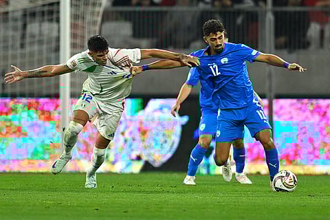 2024–25 UEFA Nations League, Israel vs Italy: Italy's Raoul Bellanova, left, challenges for the ball with Israel's Roy Revivo
